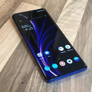 OnePlus 8 Pro smartphone in Ultramarine Blue with edge-to-edge display