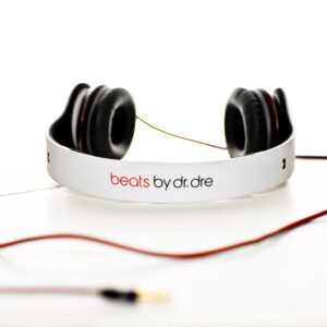 White over-ear Beats Solo wired headphones with padded ear cups and adjustable headband